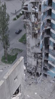 Vertical Video of a Destroyed Residential Building in Ukraine During the War alt