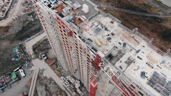 Crane Jib Near New Apartment Building at Construction Site alt