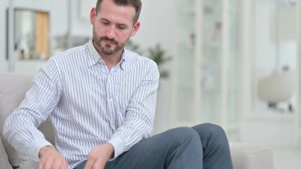 Professional Young Man Coming Back and Opening Laptop alt
