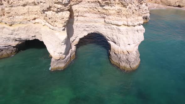 Flying over Praia Da Marinha (Marinha Beach) in Algarve, Portugal. alt