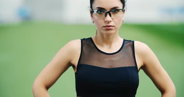 Female Athlete Preparing for Workout