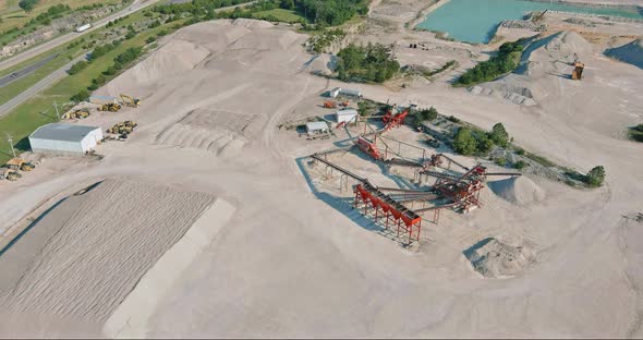 Panorama Over the Career with Stone Extraction Works Appliances Tractor Excavator Trucks alt