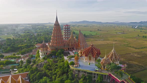 Aerial view of Big Golden Buddha Statue and pagoda in Tiger Cave Temple or Wat Tham Suea alt