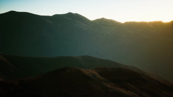 Hills with Rocks at Sunset alt