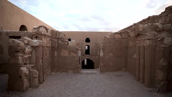 Qasr Kharana Desert Castle With Two Birds Flying into Each Other on the Far Side of Csatle Interior