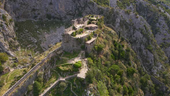 Aerial Shot of the Fortress St John San Giovanni Over the Old Town of Kotor the Famous Tourist Spot alt
