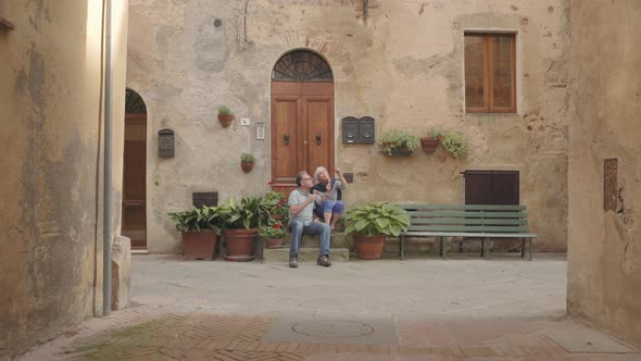 Senior couple enjoying icecream on holiday