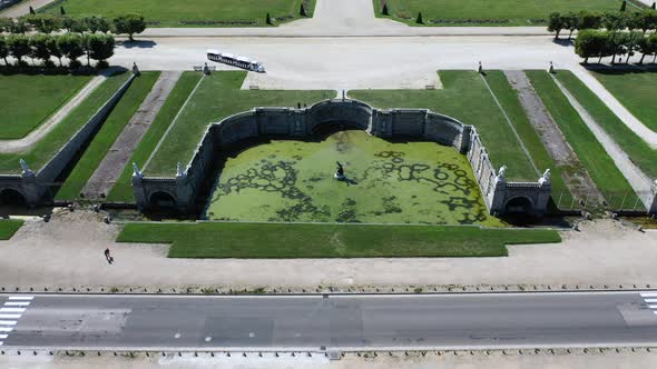 Aerial View of Medieval Landmark Royal Hunting Castle Fontainbleau and Lake with White Swans, France