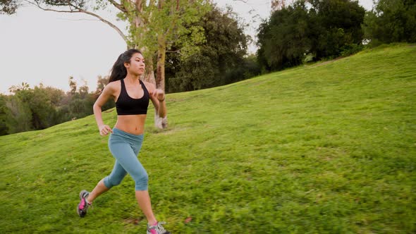 Athletic Woman Running Morning Hill alt