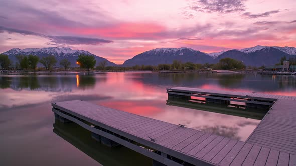 Colorful sunrise timelapse reflecting in Provo boat harbor alt