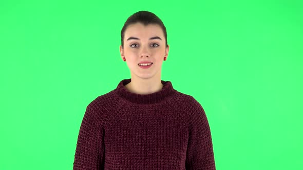 Woman Waving Hand and Showing Gesture Come Here. Green Screen alt