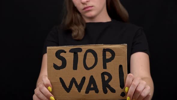 Upset Ukrainian Poor Girl Protesting Against the Military Conflict alt