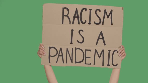 RACISM IS A PANDEMIC. Protest Text Message on Cardboard. Stop Racism. Police Violence. Banner Design alt