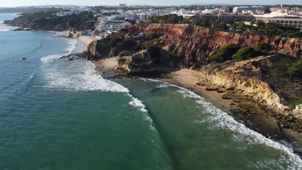 View the Drone of the Cliff on the Ocean and the Portuguese Town of Albufera