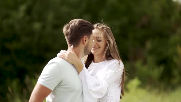 Love Kiss. Beautiful Couple Kissing In Nature. Happy Woman Meeting Handsome Man. alt