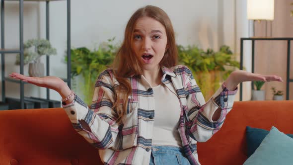 Confused Woman Raising Hands in Indignant Expression Asking Why What Reason of Failure at Home alt