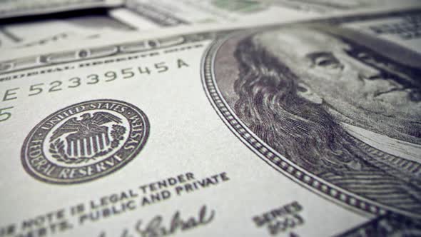 American One Hundred Dollar Paper Banknote Pile on Office Desk alt