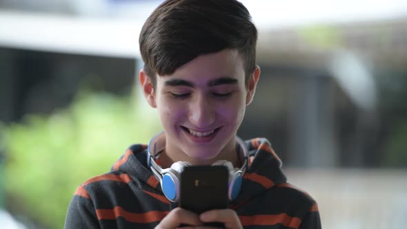 Young Handsome Iranian Teenage Boy in the Streets Outdoors alt