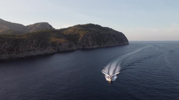 Motor Boat near Cliffs of Mallorca Island, Spain (Alcúdia) alt