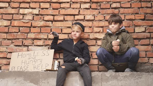 Two Poor Street Boys Need Help Asking Help Food Donation From Strangers on Street at Big City