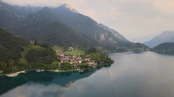 Aerial view of Ledro with lake, Trentino, Val di Ledro in North Italy. Shot in 4k alt