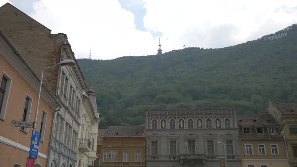 Pan right of buildings at Tampa mountain foot alt