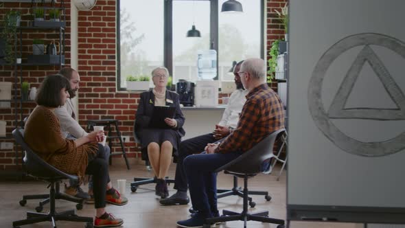 People with Addiction Meeting at Aa Group Therapy Session to Get Help From Psychiatrist alt