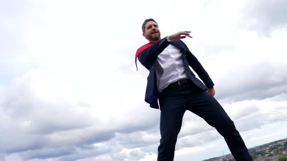 Successful Professional Employee Man in Formal Suit Dance in Cloudy Sky Dancing alt