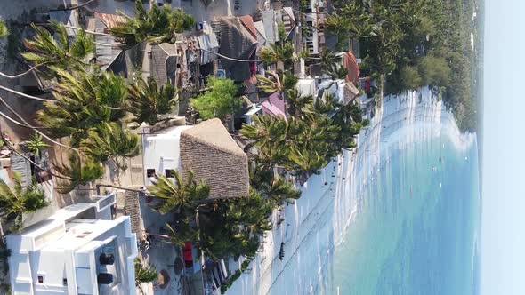 Tanzania  Aerial View of Houses Near the Coast of Zanzibar Vertical Video alt
