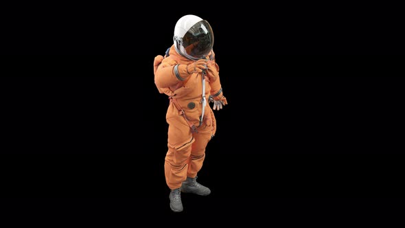 Astronaut in Orange Space Suit Raising Hand