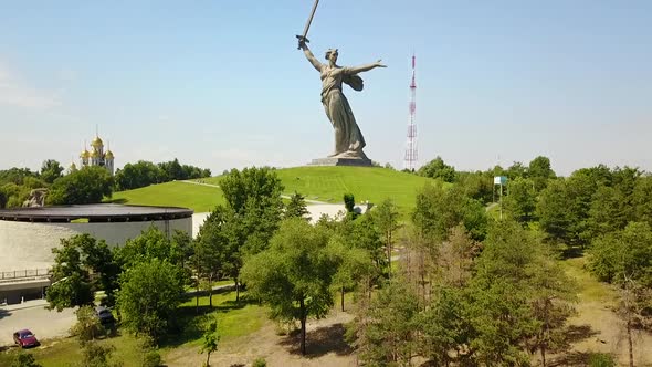 Aerial Shot Of the Motherland Statue in Mamaev Kurgan. Stalingrad / Volgograd. Visitors and Tourists alt