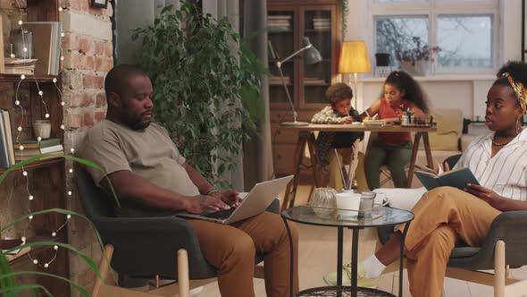 Afro Family At Home In Evening alt