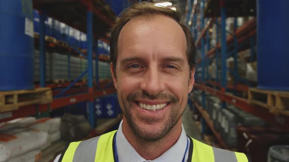 Portrait of male manager in a warehouse alt