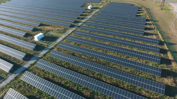 Aerial Shot of a Solar Power Station with a Lot of Mirror Panels Rows in Ukraine  