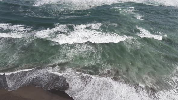 Sandy beach in sunny day in Yogyakarta, Indonesia, Parangtritis Beach. Dramatic light alt