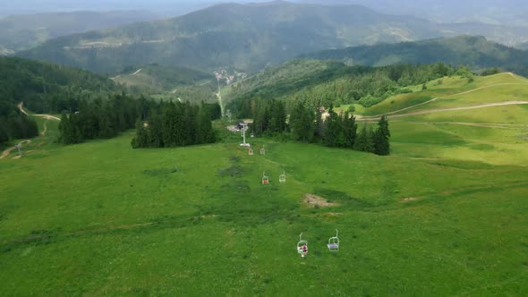 Aerial View of Chair Lift in Mountains Summertime alt
