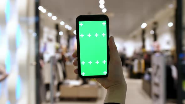 The Phone is in an Upright Position with a Green Screen alt