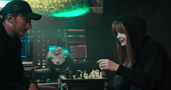 A Group of Hackers Organizes an Attack on Data Servers Their Hideout is Dark with alt