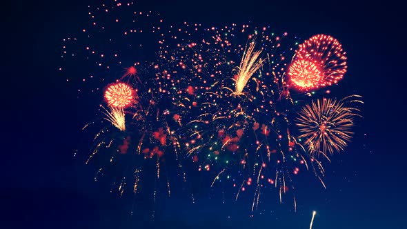 Golden Fireworks Are Bursting in the Dark Sky. alt