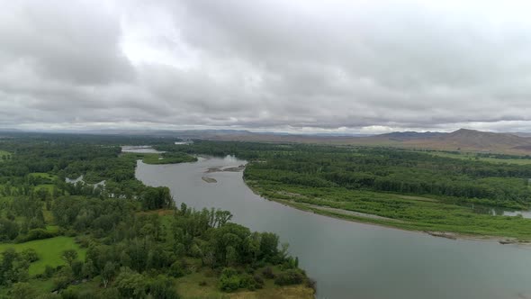 River under Storm Clouds alt
