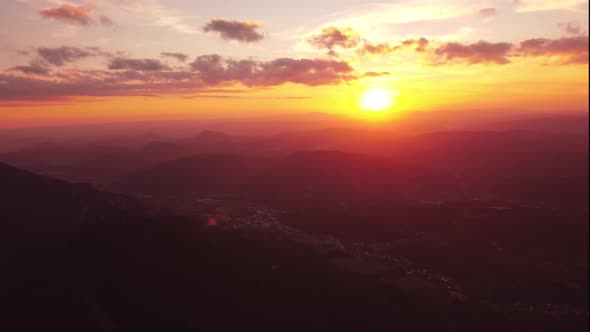 Epic Aerial Flight in the Clouds at Sunset