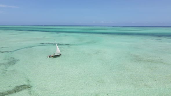 Boats in the Ocean Near the Coast of Zanzibar Tanzania Slow Motion alt