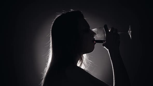 Miserable Woman in Depression, Drinking Alcohol