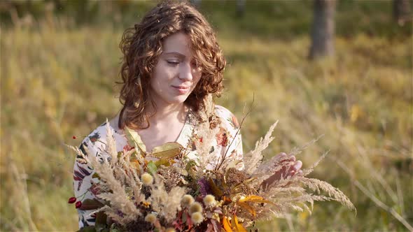 Woman Walking on a Meadow in Summer alt
