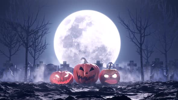 Halloween Pumpkins on the Background of the Cemetery and the Moon alt