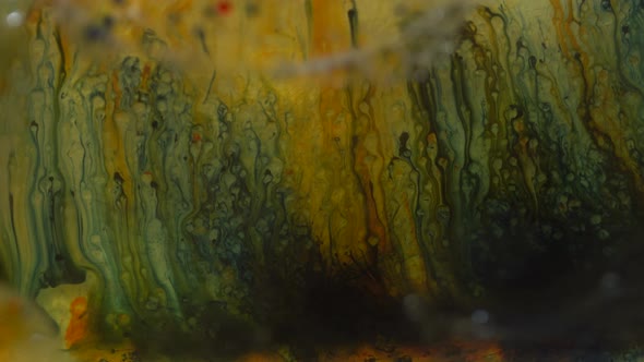 Yellow, Red And Green Oil Texture Floats Beautifully In The Water, Horror