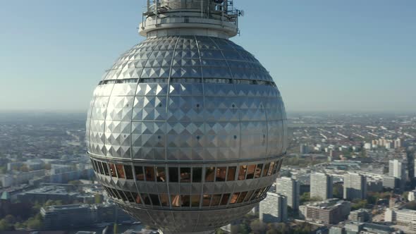 AERIAL: Super Close Up View Circle Around the Alexanderplatz TV Tower in Berlin, Germany alt