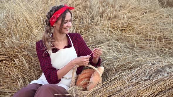 Female Farmer Sitting Wheat Agricultural Field Woman Baker Holding Wicker Basket Bread Product alt