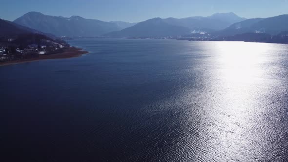 Aerial shot of a blue mountain lake in the alps. Lake Tegernsee in Bavaria, Germany.