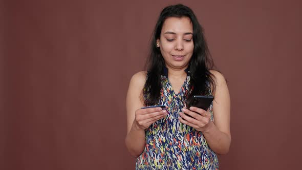 Modern Adult Shopping with Credit Card on Online Website alt